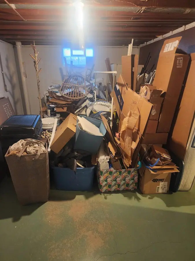 Roll-off dumpster container at job site for 15 Yard Dumpster Rental in Baldwin